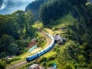 Railway On Mountain Near Houses